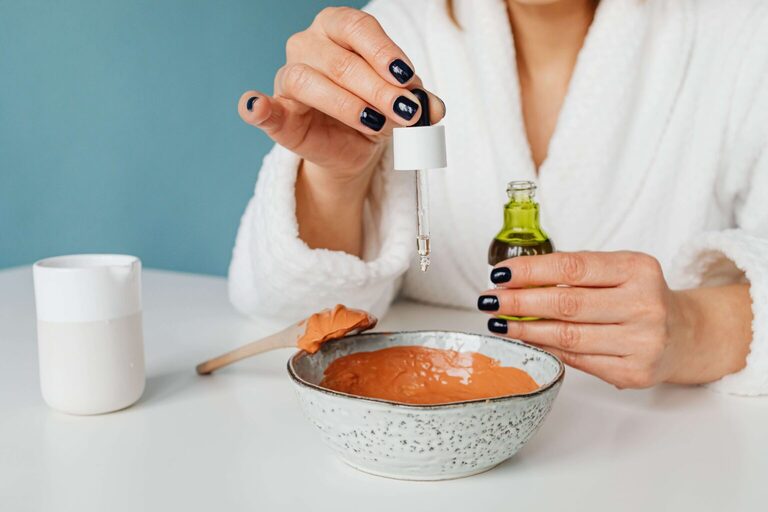 close up of woman making a facemask at home. best at home facial kit. Self care sunday. diy face mask. diy facial at home. at home facial steps. at home facial steamer. Best facial for glowing skin. how to get radiant skin.
