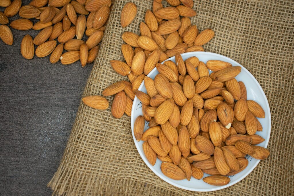 overflowing bowl of almonds. weekend reset. weekend reset routine. wellness retreat. Bedroom retreat ideas. wellness retreat. home retreat ideas. Refreshed. self care weekend. self care weekend ideas. how to have a self care weekend.