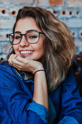 portrait of beautiful woman wearing glasses. how to look put together. how to always look put together. how to look put together every day. how to look put together all the time. how to look put together with minimal effort. that girl. How to glow up overnight.