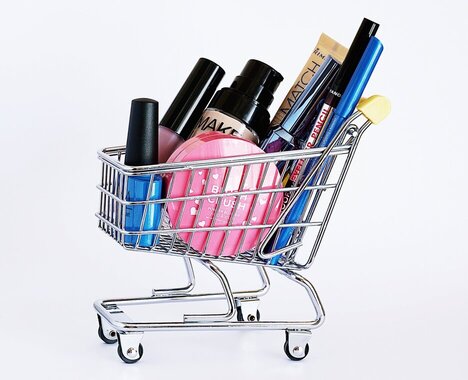 mini shopping trolley full of makeup products. galentines dinner ideas. February 13th. galentines day ideas. when is galentines day. girls night cocktails. girls night dinner ideas. girls night snack ideas. girls night in ideas.what to do for girls night. what to do on a girls night. Girl dinner.