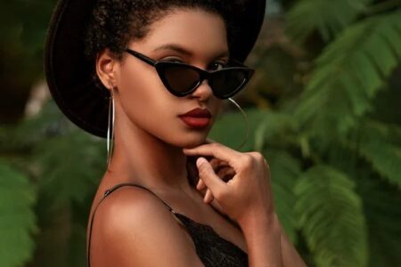 beautiful stylish young woman posing in sunglasses. good habits. good habits examples. what are good habits. what is one of the core habits practiced by the most successful people? non negotiable examples. Work life balance tips. how to balance work and family life.