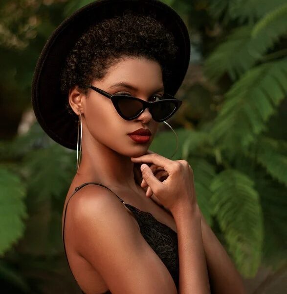 beautiful stylish young woman posing in sunglasses. good habits. good habits examples. what are good habits. what is one of the core habits practiced by the most successful people? non negotiable examples. Work life balance tips. how to balance work and family life.