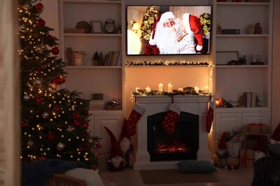 christmas movie on a tv over the fireplace. Christmas girls night. Christmas party. Christmas ladies night. holiday girls night. Christmas cocktails. girls night in. holiday party theme. ugly sweater party. 