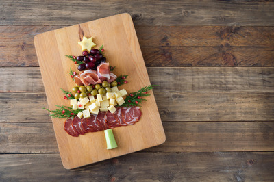 Christmas tree shape Charcuterie board. Christmas girls night. Christmas party. Christmas ladies night. holiday girls night. Christmas cocktails. girls night in. holiday party theme. ugly sweater party. 