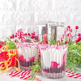 Christmas cocktails with candy canes. Christmas girls night. Christmas party. Christmas ladies night. holiday girls night. Christmas cocktails. girls night in. holiday party theme. ugly sweater party. 